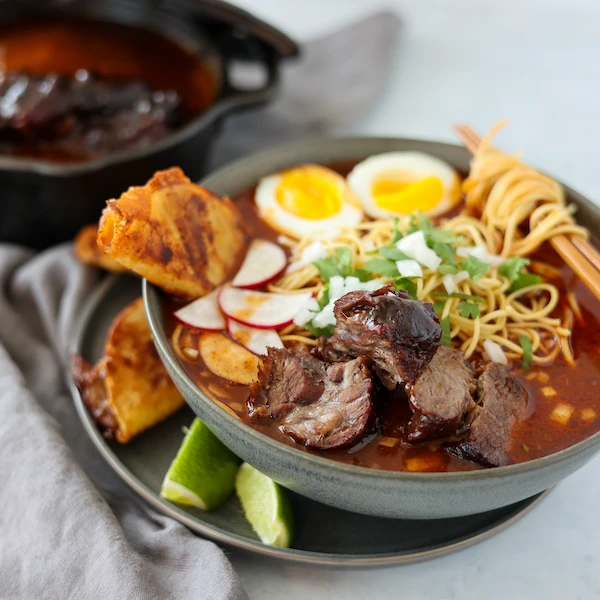 beef birria ramen bowl
